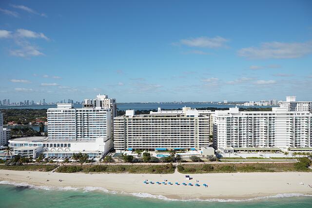 loc-Aerial-view-of-a-lavish-seaside-condominum-apartment-building-in-Miami-Beach.jpg