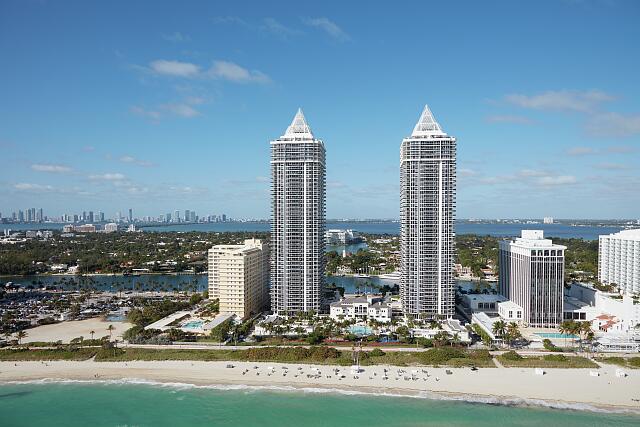 loc-Aerial-view-of-twin-condominium-towers-in-Miami-Beach-a-bony-finger-like-bar.jpg