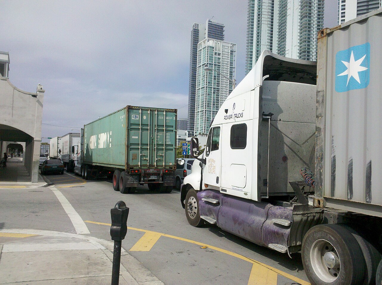 Container_trucks_leaving_the_Port_of_Miami_through_downtown.jpg