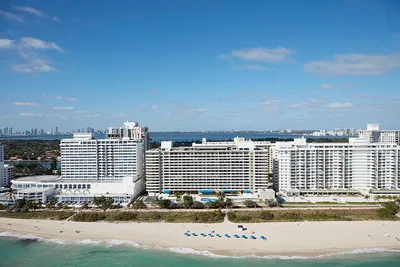 loc-Aerial-view-of-a-lavish-seaside-condominum-apartment-building-in-Miami-Beach.jpg