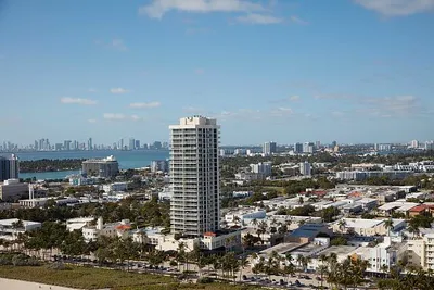 loc-Aerial-view-of-a-lone-apartment-building-or-condominum-in-Miami-Beach-a-bony.jpg