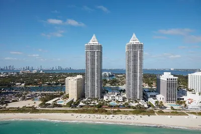 loc-Aerial-view-of-twin-condominium-towers-in-Miami-Beach-a-bony-finger-like-bar.jpg
