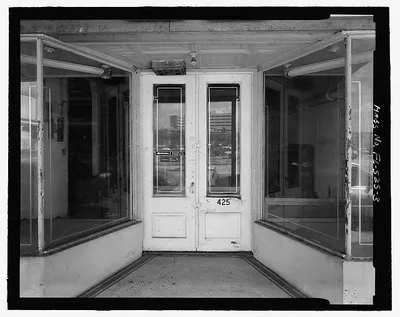 loc-Doorway-of-425-North-Miami-Avenue-pressed-tin-ceiling-is-visible-over-entry-.jpg