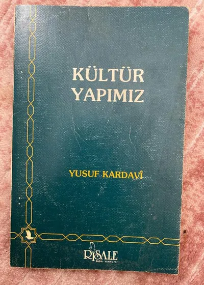 _K_lt_r_Yap_m_z__Yusuf_El-Kardavi