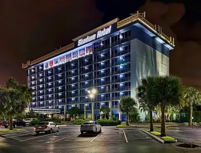 Stadium_Hotel__21485_NW_27th_Avenue__Miami_Gardens__Florida__USA___Built__1974___Floors__9___Height__109.77_ft___Structural_Material__Concrete___Architectural_Style__Postmodernism