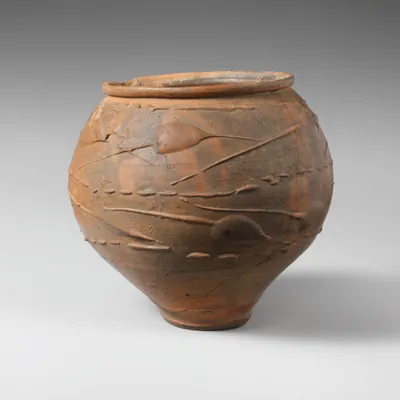 Terracotta_beaker_with_barbotine_decoration