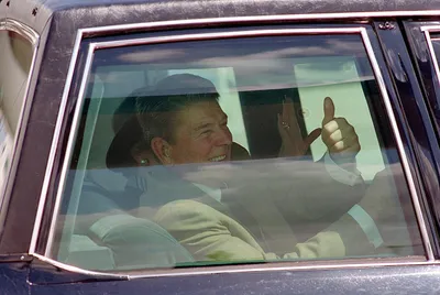 President_Ronald_Reagan_During_a_Trip_to_Miami__Florida_and_His_Departure_Via_Limousine_from_Miami_International_Airport_Giving_The_Thumbs-Up_Sign_-_DPLA_-_8432e2b1186469ad01611ec37036e14e.jpg